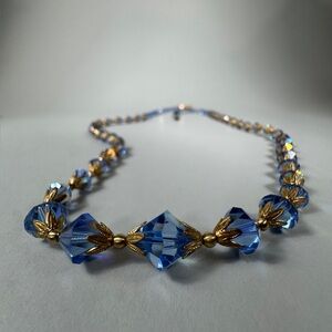 Vintage blue aurora borealis crystal bead necklace with gold-tone spacers
